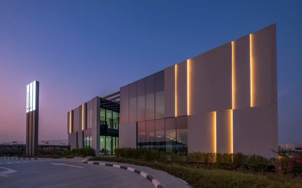 Office design featuring Laminam Calce Grigio exteriors.