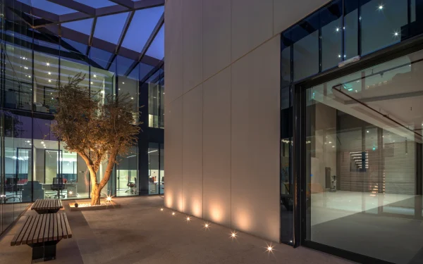 Office design featuring Laminam Calce Grigio exteriors.