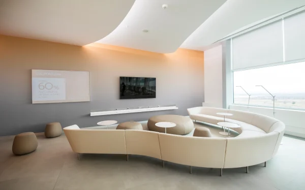 Luxury airport interior featuring Laminam Calce Grigio Italian porcelain surfaces with soft grey tones, enhancing the modern and sophisticated ambiance.
