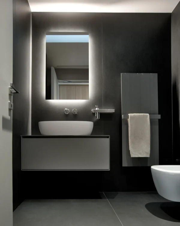 Custom home interiors featuring Laminam Calce Nero porcelain.