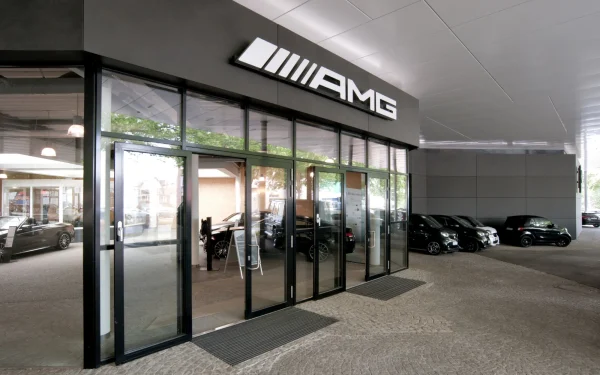 German car dealership utilizing Laminam Calce Nero Italian porcelain, offering sleek black surfaces that complement the contemporary showroom design.