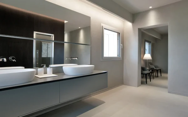 Custom home interiors featuring a blend of Laminam Calce Avorio, and Nero Italian porcelain, combining rich textures and tones for a unique design.