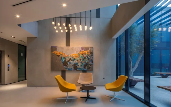 Office design featuring Laminam Calce Antracite, Calce Grigio, and Bianco Statuario Venato Italian porcelain; a combination of dark and light tones creating a balanced and professional environment.