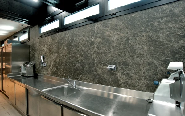 Italian café interiors featuring Laminam Emperador Extra porcelain surfaces, characterized by rich brown tones and intricate veining, creating a luxurious atmosphere.