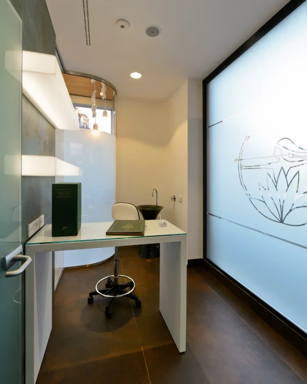 Retail pharmacy in Italy featuring Laminam Ossido Bruno Italian porcelain flooring; rich brown tones providing a warm and inviting atmosphere for customers.