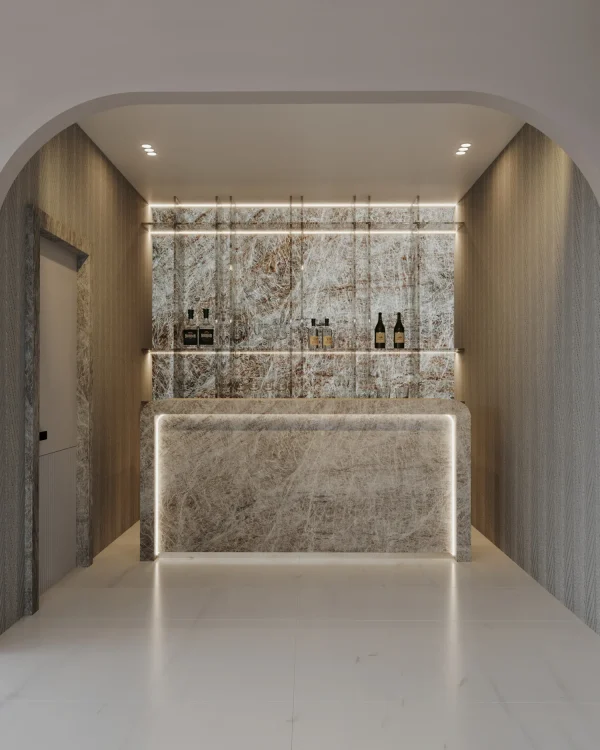 Leathered 2 cm Naica quartzite slab in gray and brown tones; showcased in a luxury showroom.