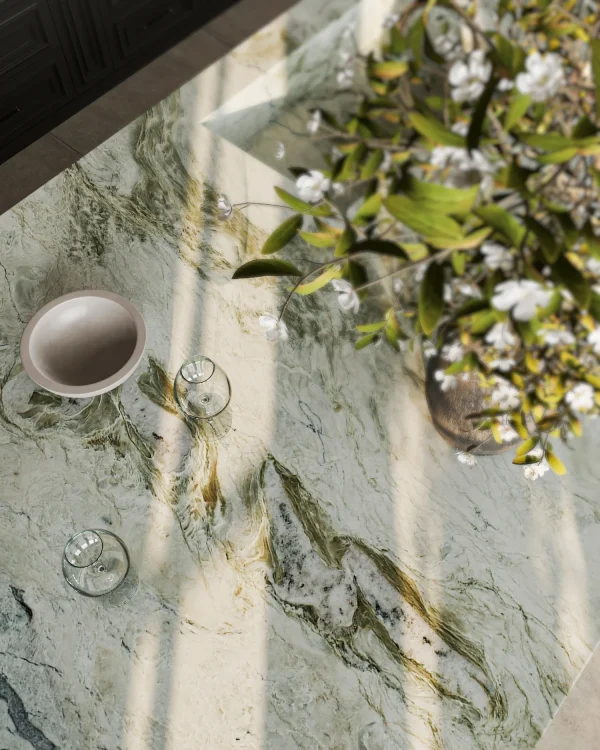 Leathered 2 cm Van Gogh quartzite slab blending green and taupe tones; artistic focal for kitchens in Coral Gables.