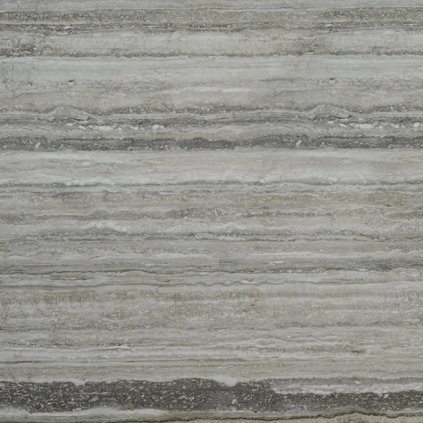 Honed filled Travertino Romano slab in dark grey and grey tones; stylish for residential and commercial interiors in Miami.